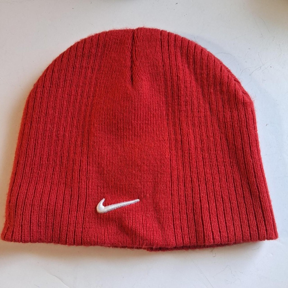 Red knit beanie with white swoosh *no nike tag